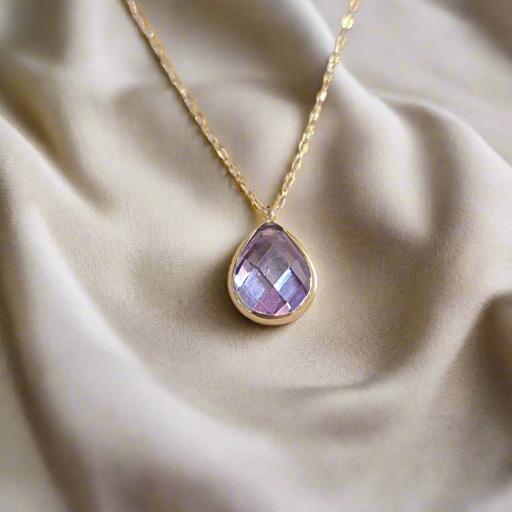 14K Gold necklace with purple zirkon drop