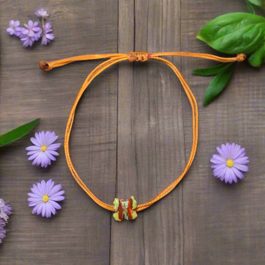 Buttrefly bracelet with orange cord