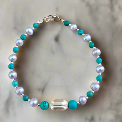 Handmade  sterling silver bracelet with grey pearls and turqoise gems