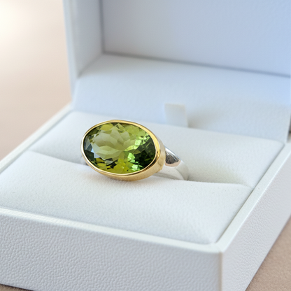 Handmade 18K and sterling silver ring with oval peridot
