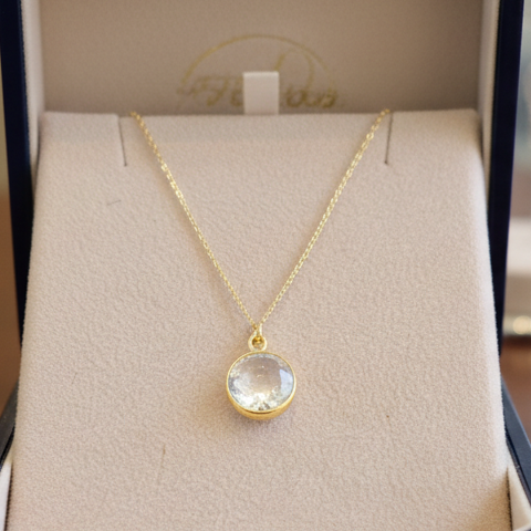 Gold played sterling silver pendant with  rock crystal.