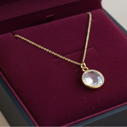 Gold played sterling silver pendant with  rock crystal.