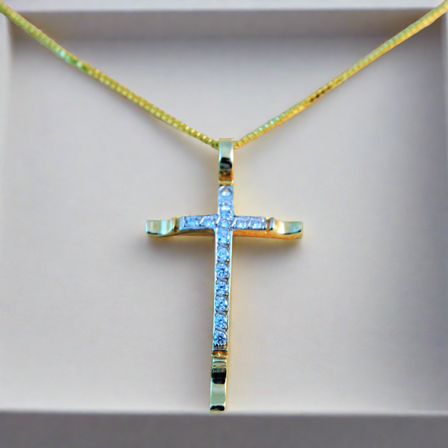 14K Gold cross with zirkons