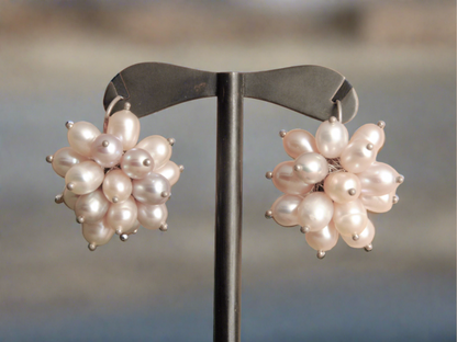 Sterling silver earrings with a  pearl bouquet.