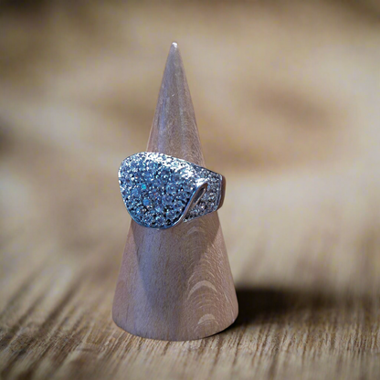 Folded sterling silver ring with zirkons