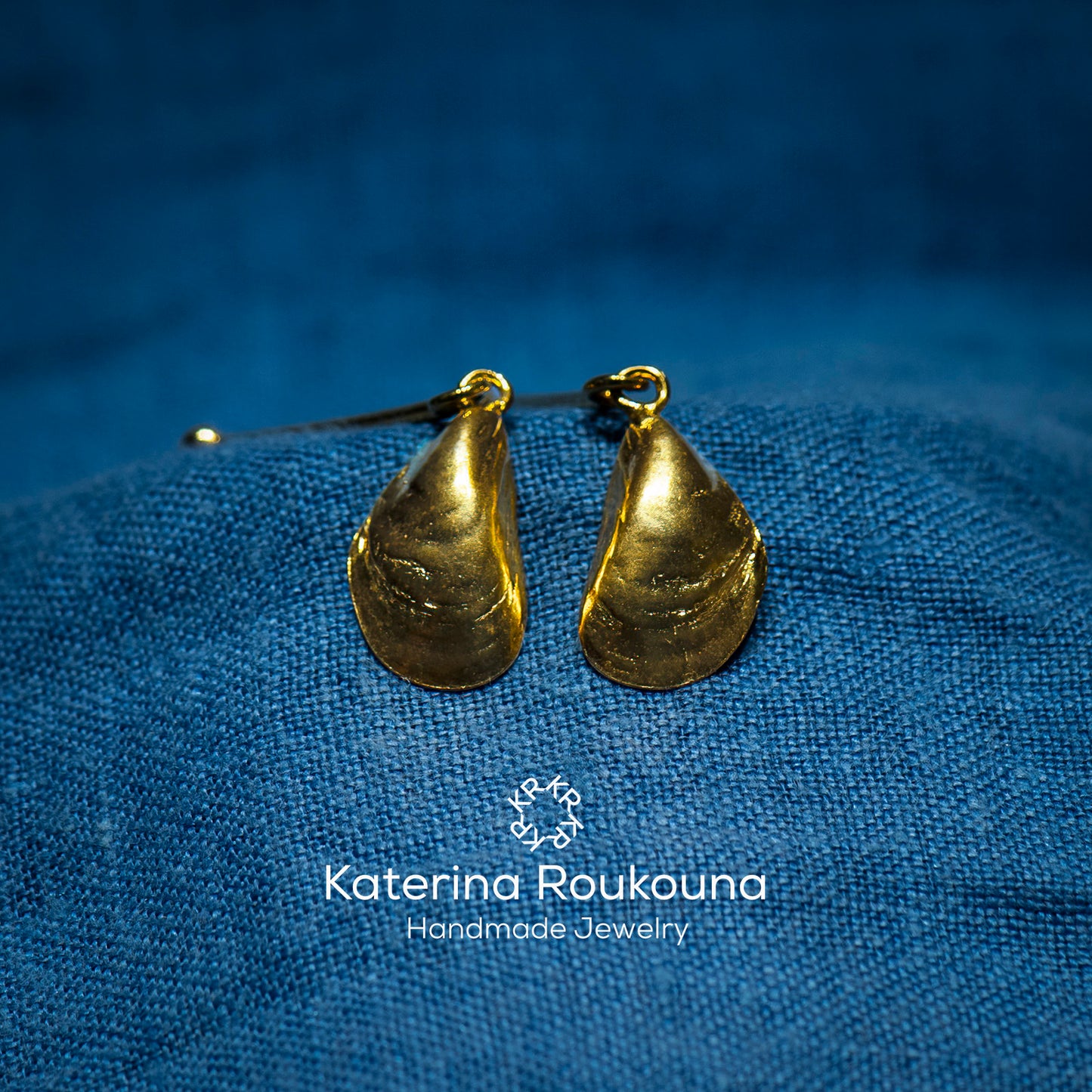 Long gold plated sterling silver earrings-mussels