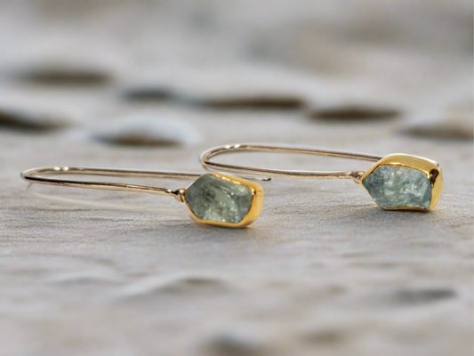 Handmade 18K gold and sterling silver long earrings with raw aquamarines