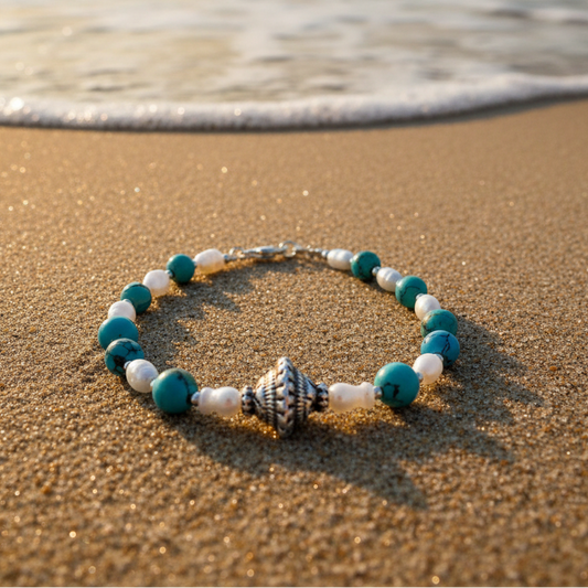 Handmade bracelet with an antique sterling silver element, pearls ans turqoise. - Katerina Roukouna