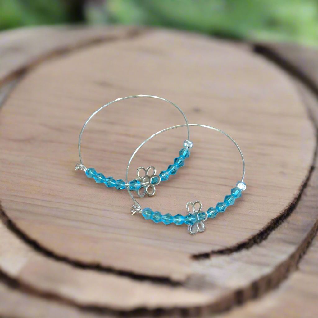 Handmade sterling silver hoops with marguerites (II)