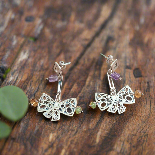 Handmade sterling silver earrings with bows
