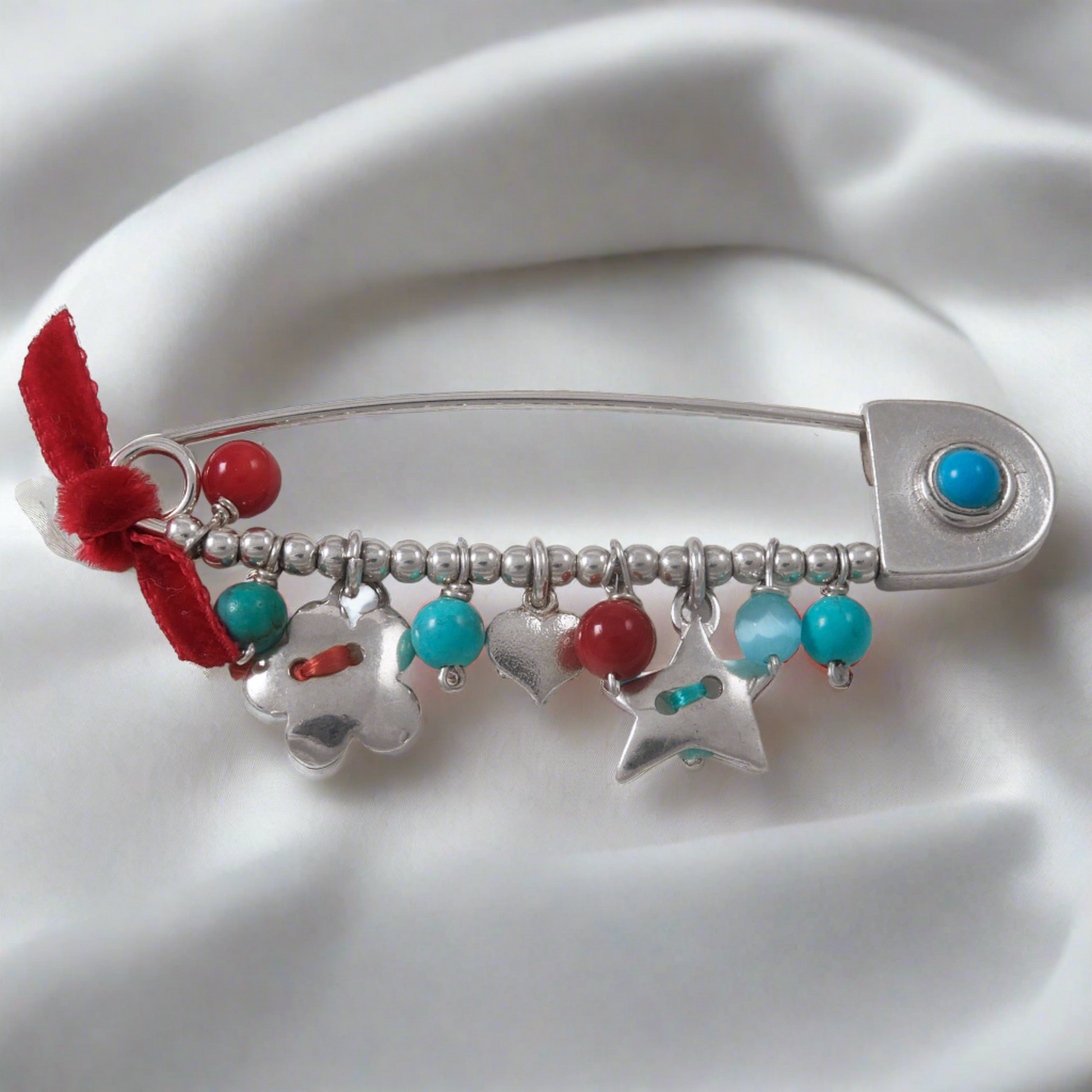 Handmade sterling silver brooch with turqoise and corals beads,  a heart , a flower and a star