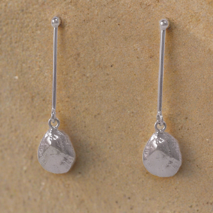 Long sterling silver earrings with limpets