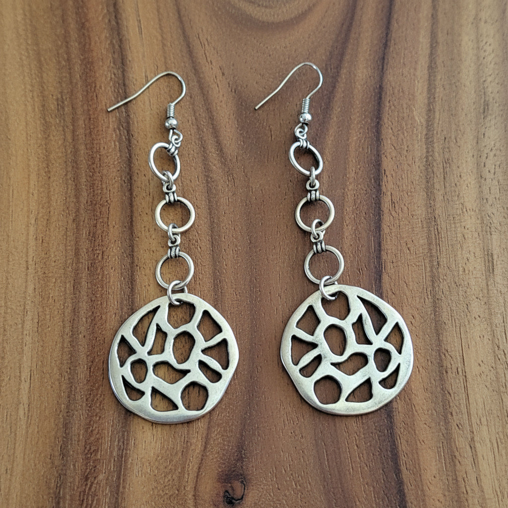 Pair of  earrings with intricate designs 