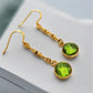Handmade gold plated sterling silver earrings with peridots
