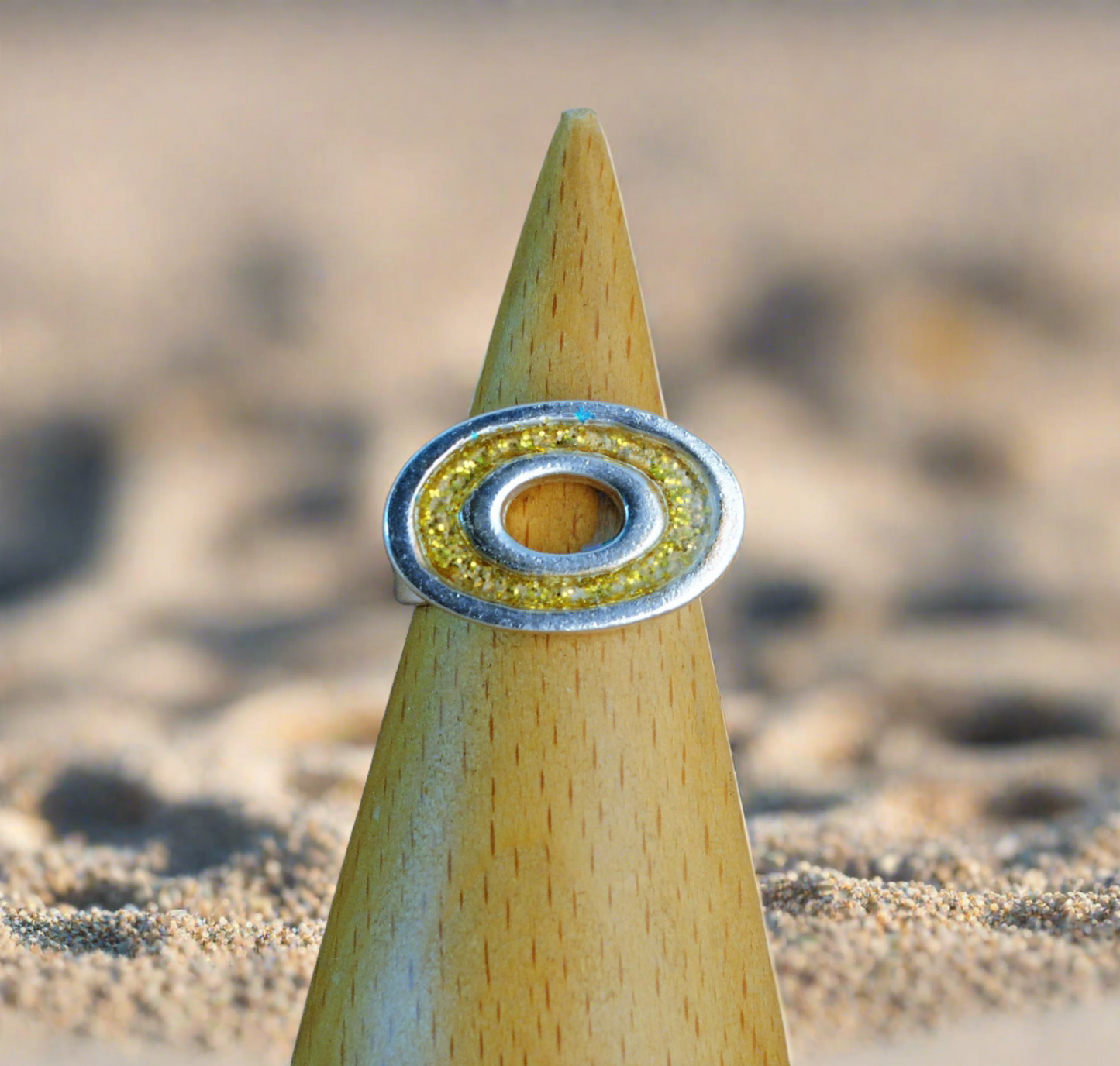 Oval gold glittered silver ring
