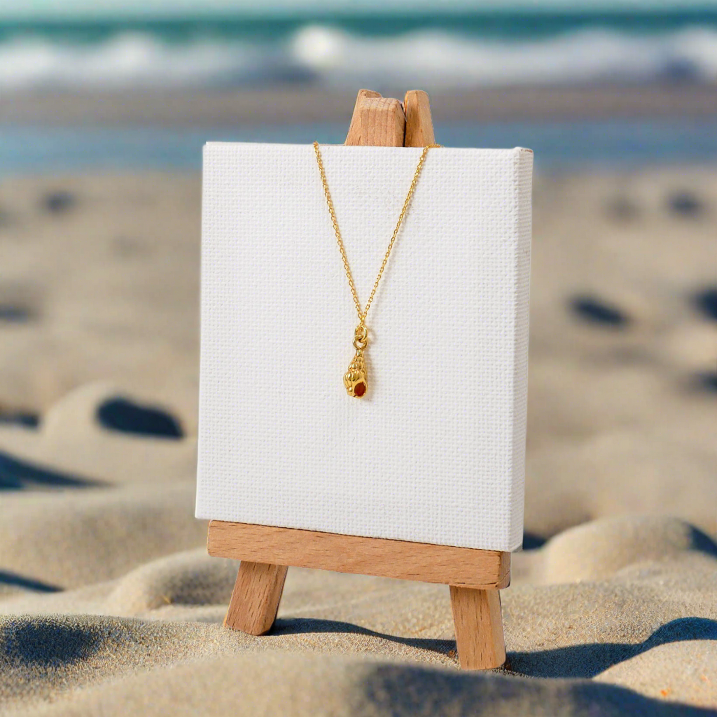 Tiny sea shell gold plated  silver necklace