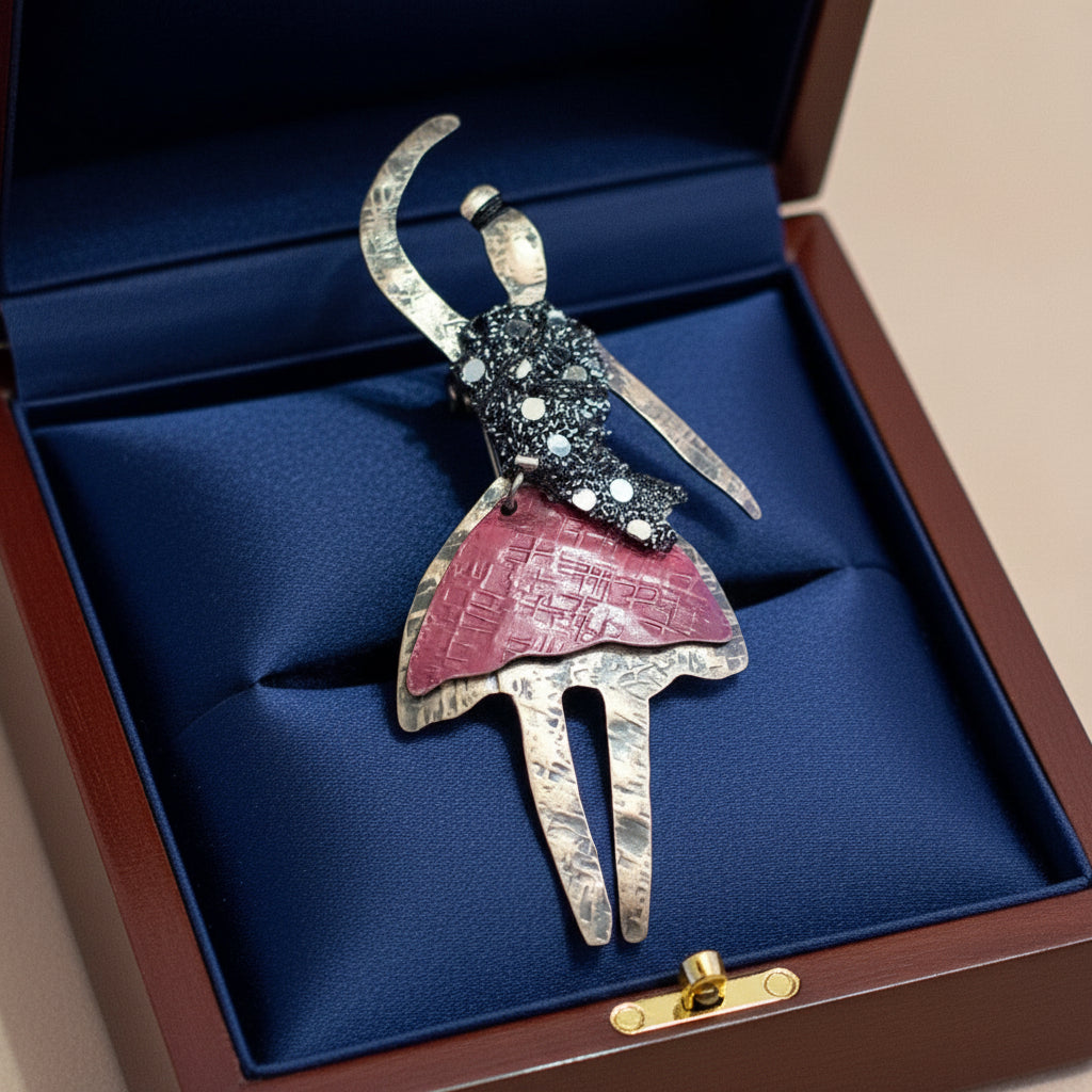 Silver brooch- a dancer 