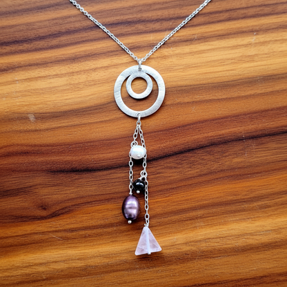 Silver pendant with gems ans pearls