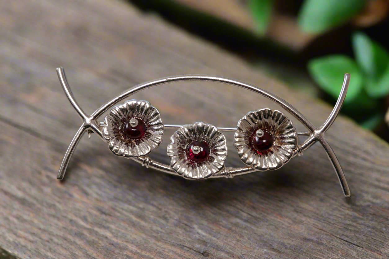 Sterling silver brooch with three Anemones with Garnets 