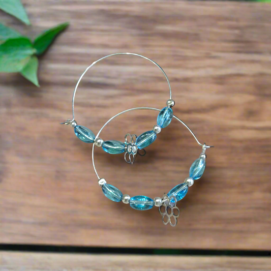 Sterling silver hoops with marguerites and blue beads