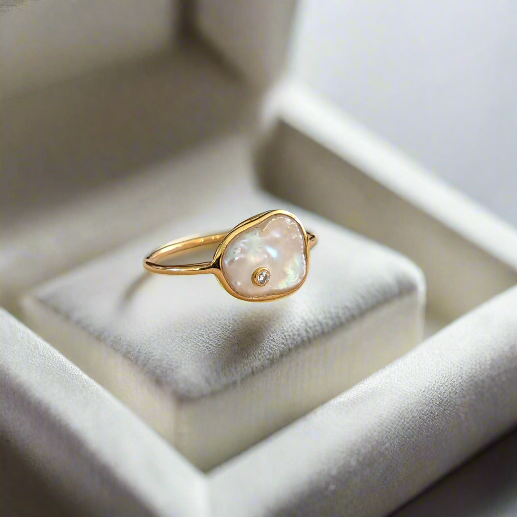 Handmade goldplated sterling silver ring with pearl and zirkon