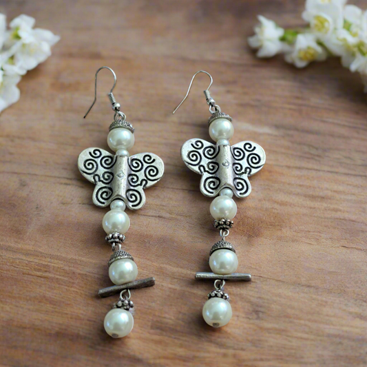 Earrings with butterflies and imitation pearls