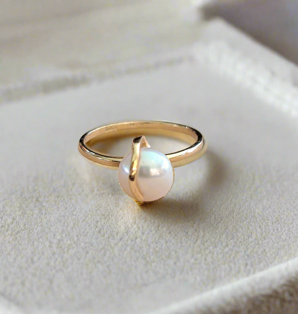 14K Gold ring with a round white pearl