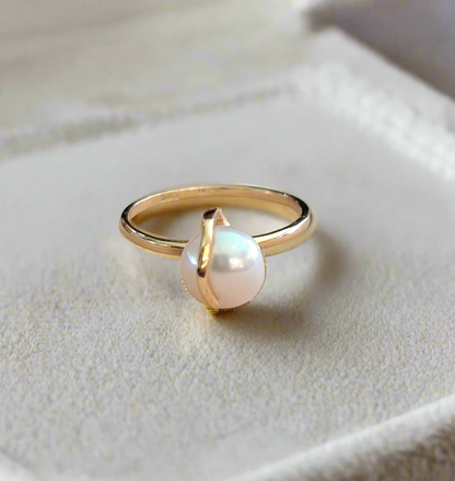 14K Gold ring with a round white pearl