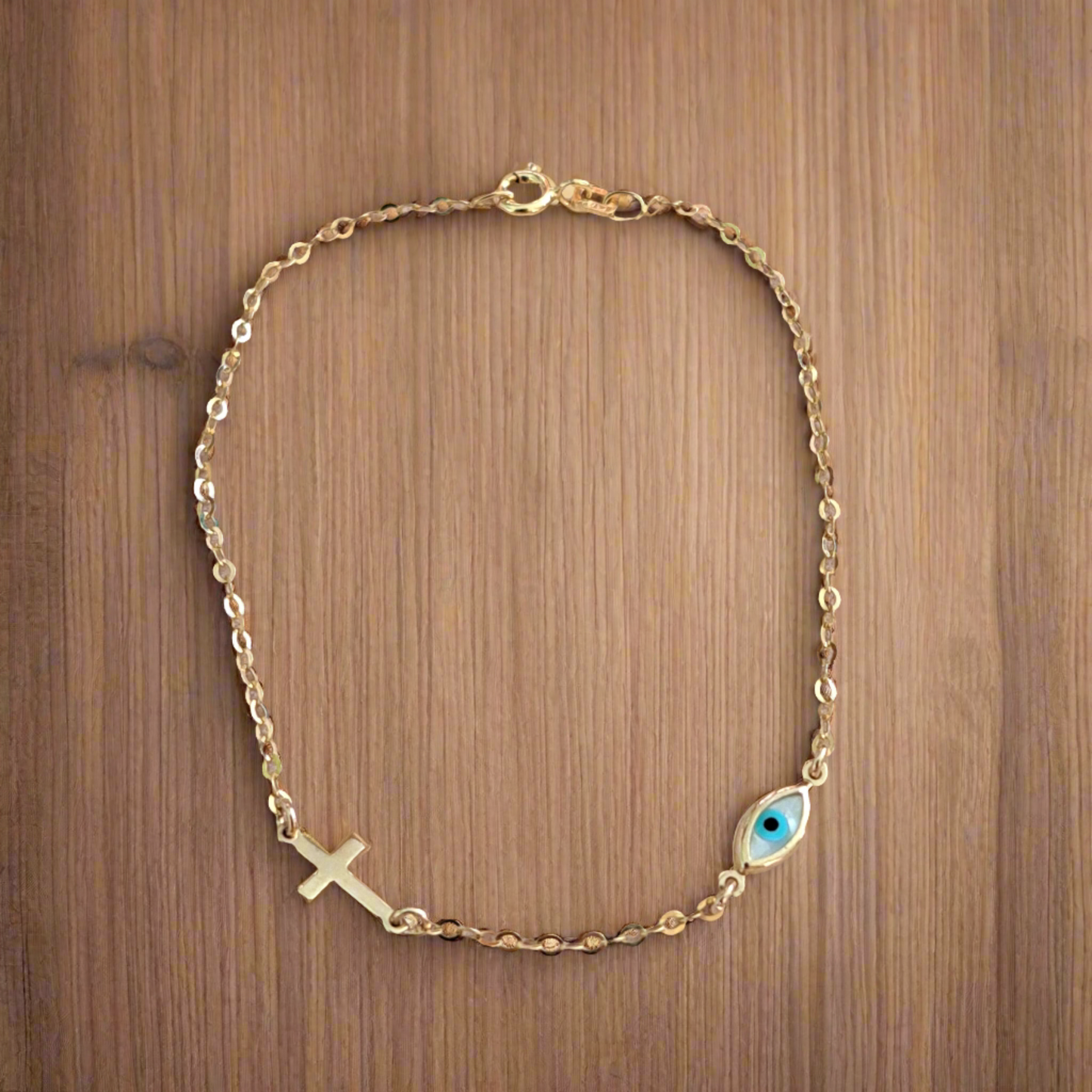 9K Gold bracelet with cross and evil eye