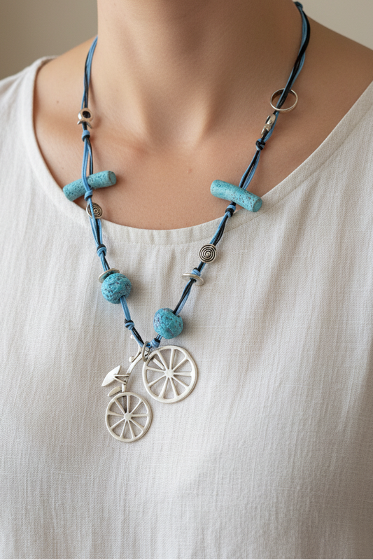 Handmade long necklace with  ceramics and a bicycle