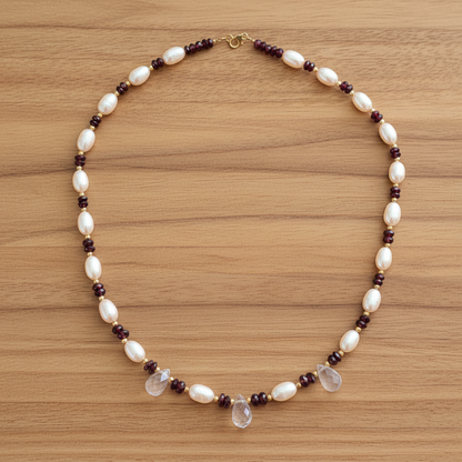 Handmade necklace with pearls, garnets, quartz and 18k gold.