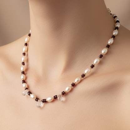 Handmade necklace with pearls, garnets, quartz and 18k gold.