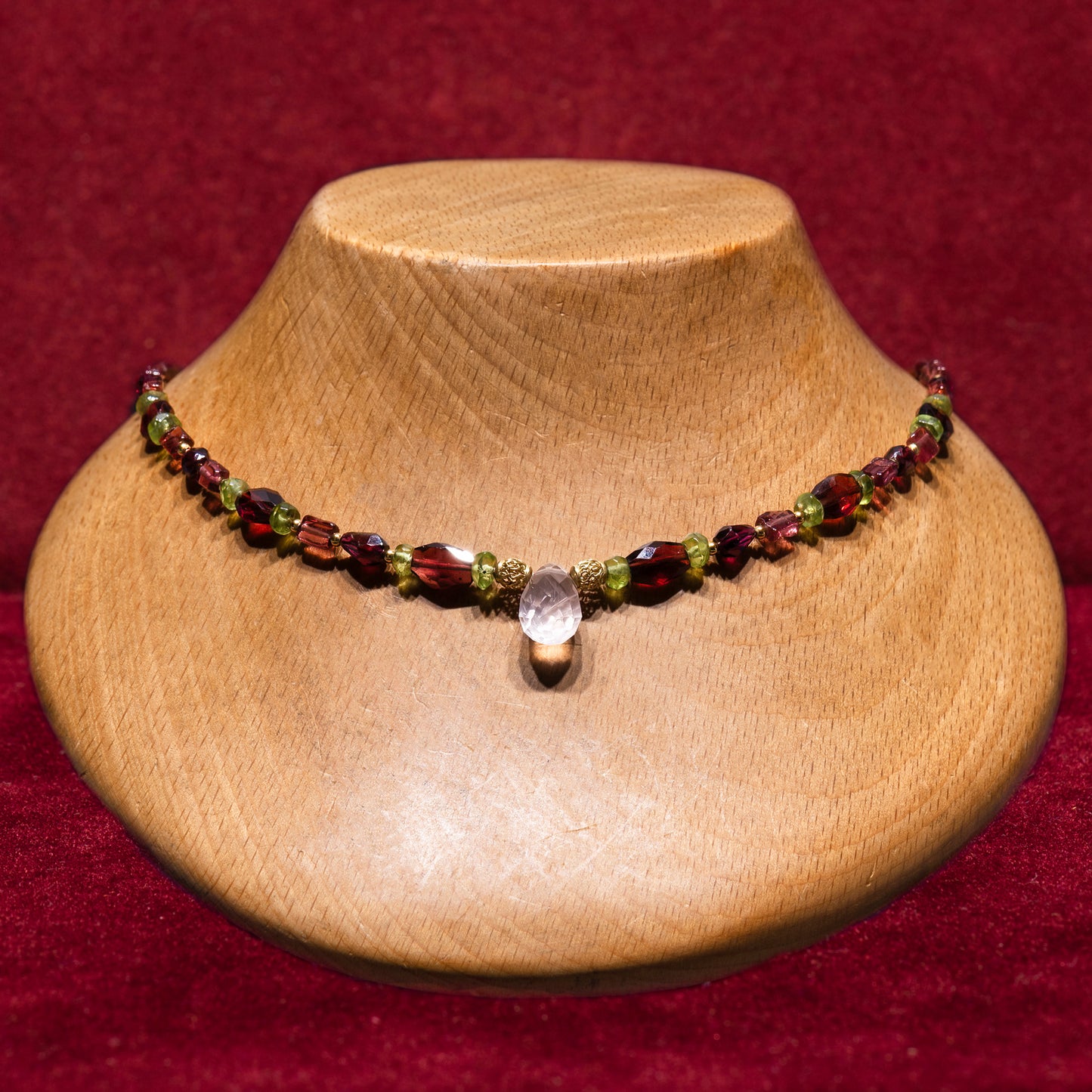 Garnets,peridots,rose quartz and 18k gold necklace.