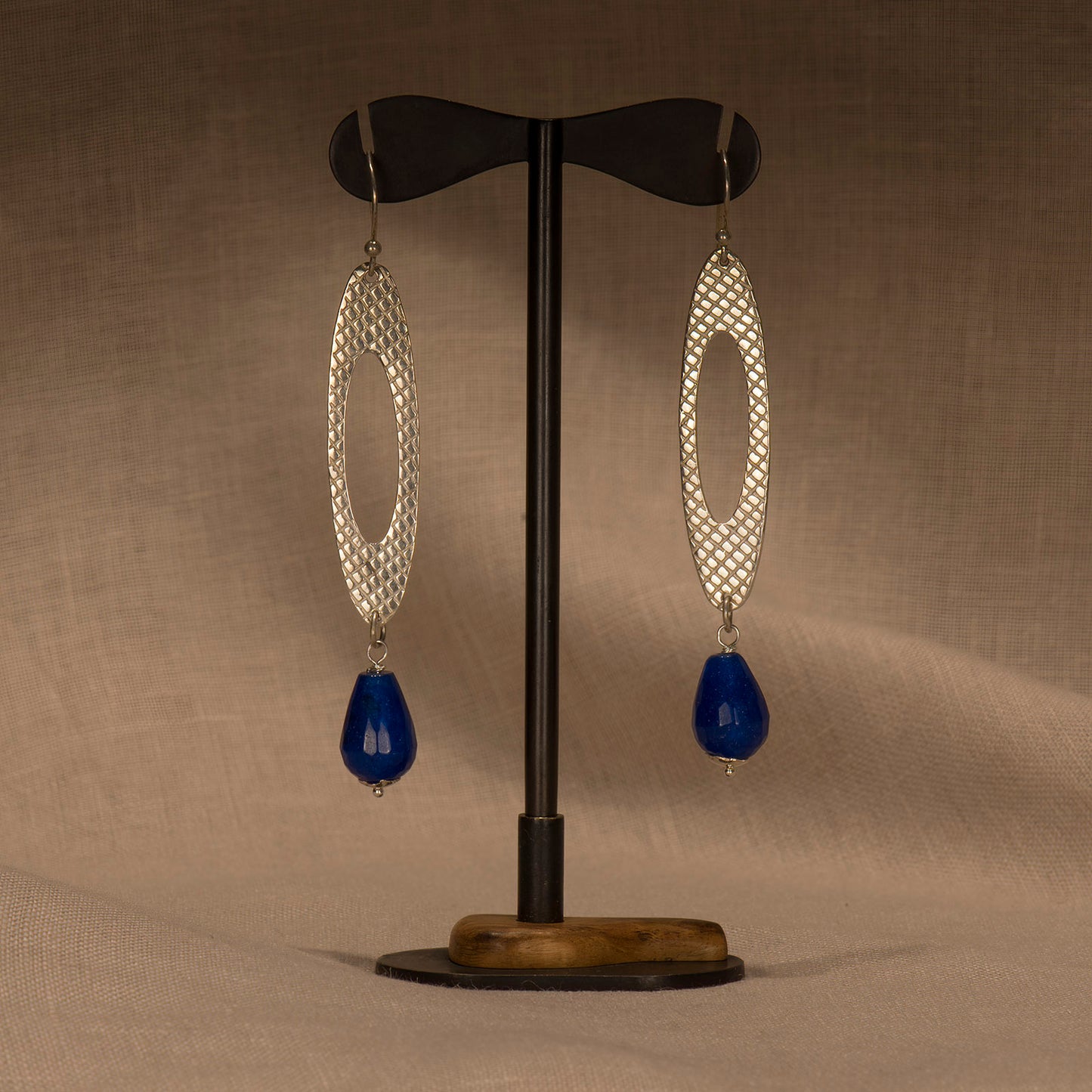 Oval silver earrings with blue agates