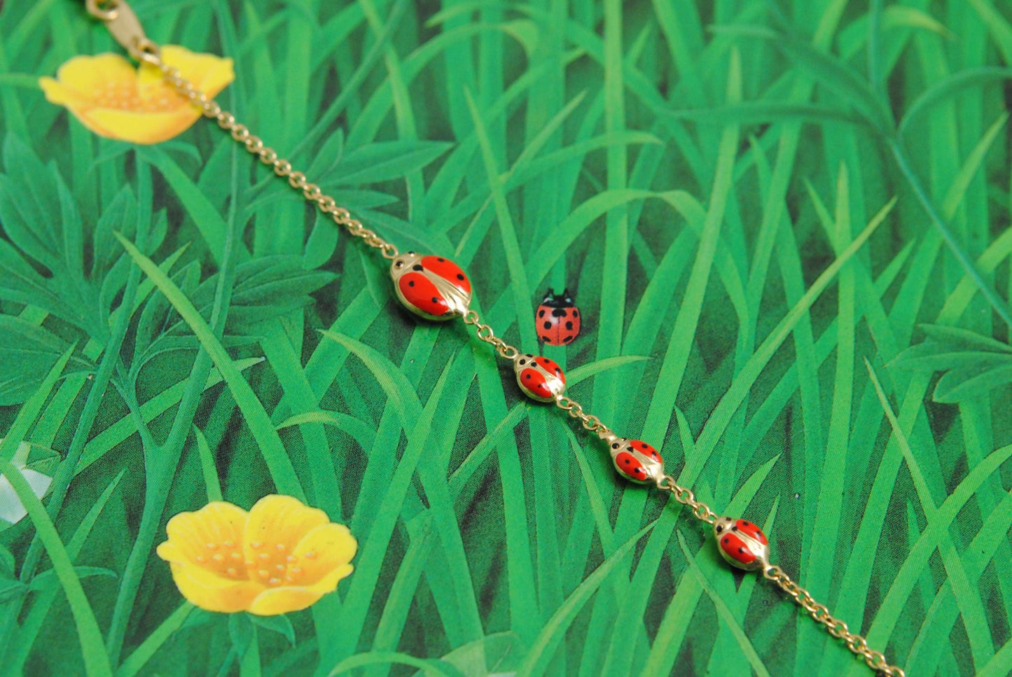 18K gold ladybirds baby bracelet