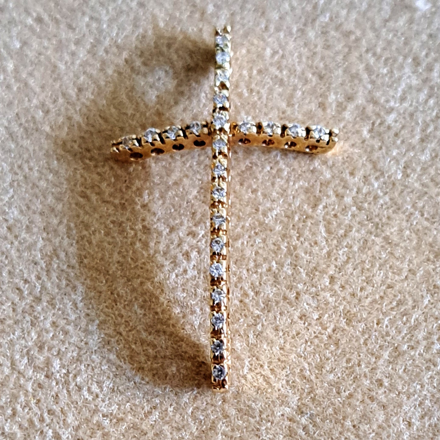 14k Yellow Gold Cross (curved) with zirkons