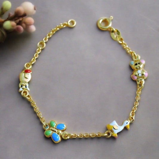 14k gold bracelet for a child, with a baby bare ,a&nbsp; cut ,a butterfly,and a duck painted with enamel.