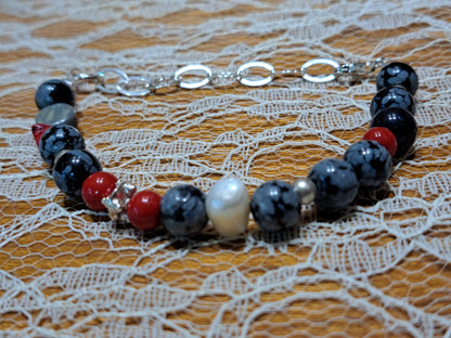 Handmade bracelet with onyx, corals, sterling silver and a pearl
