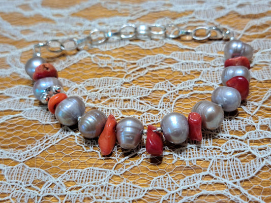 Handmade bracelet with grey pearls, corals and sterling silver