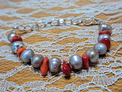 Handmade bracelet with grey pearls, corals and sterling silver