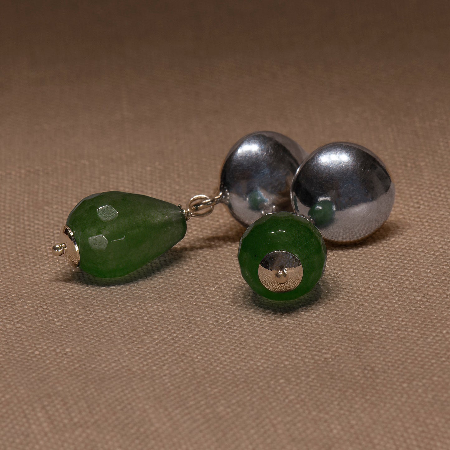Silver earrings with green oval agates