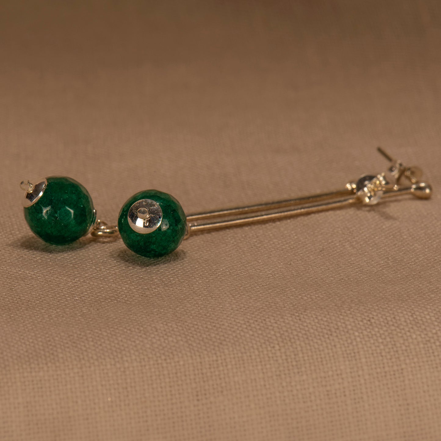 Silver earrings with  round green agates