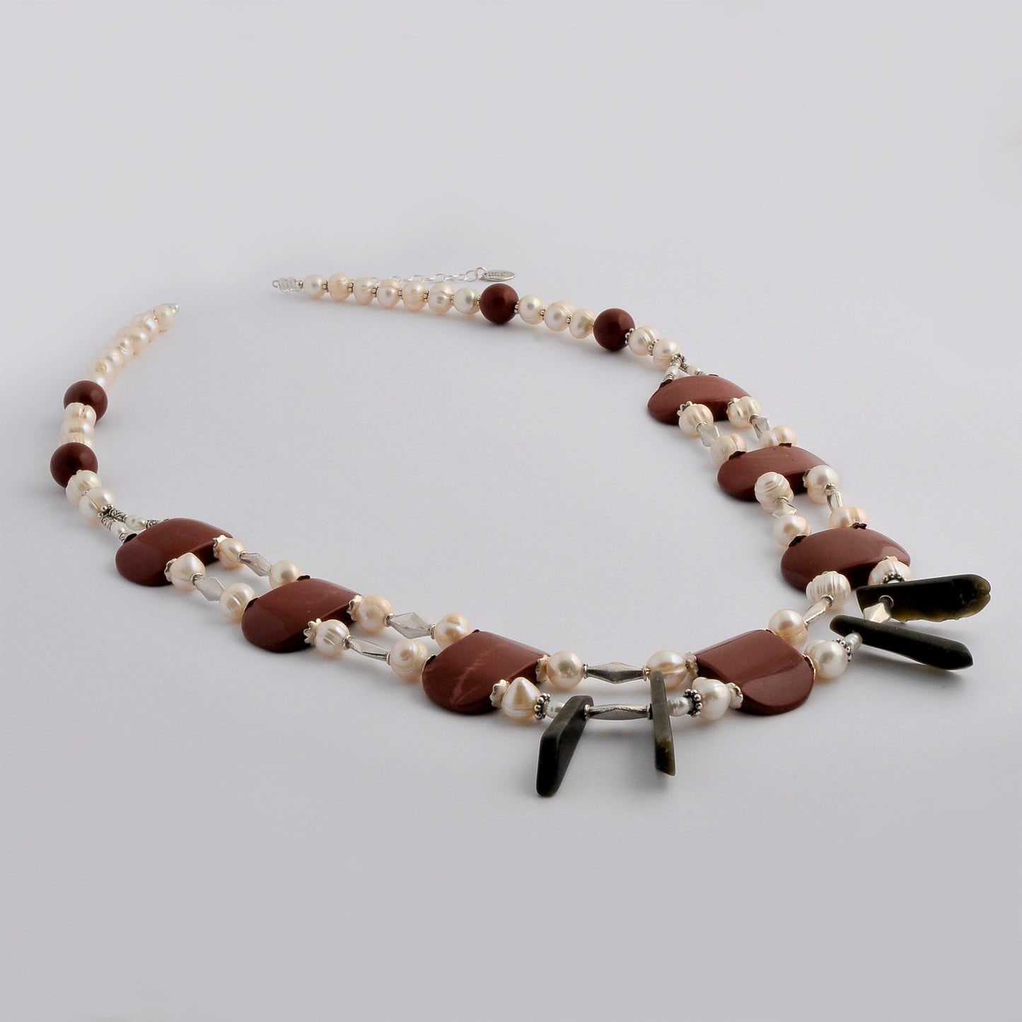 Handmade  necklace with pearls, jasper, onyx and sterling silver elements.