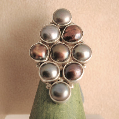 Handmade  sterling silver ring with nine pearls