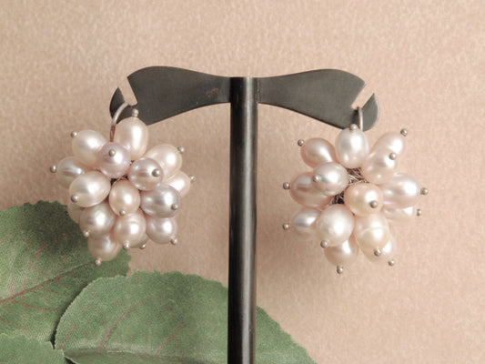 Sterling silver earrings with a  pearl bouquet.