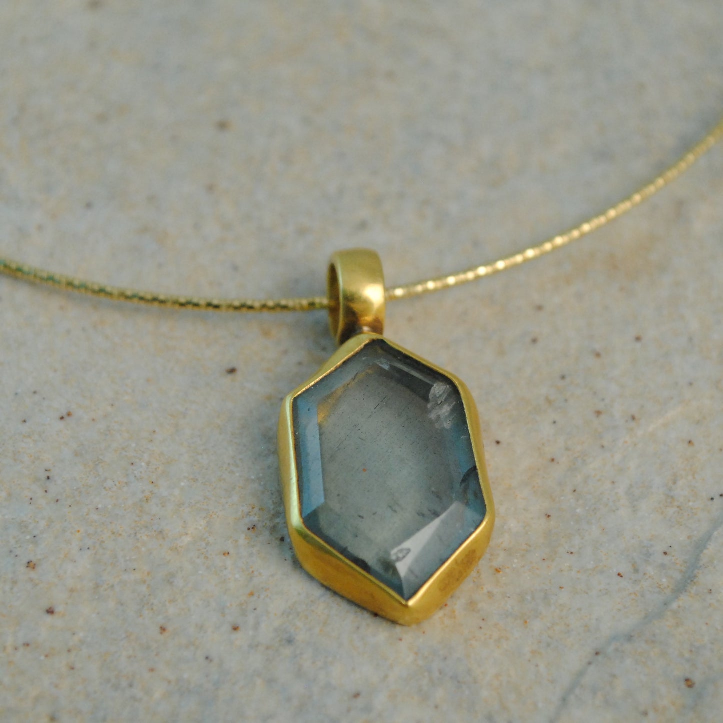 Golden pendant 22K with aquamarine
