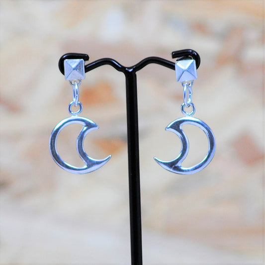 Silver earrings with  moons .