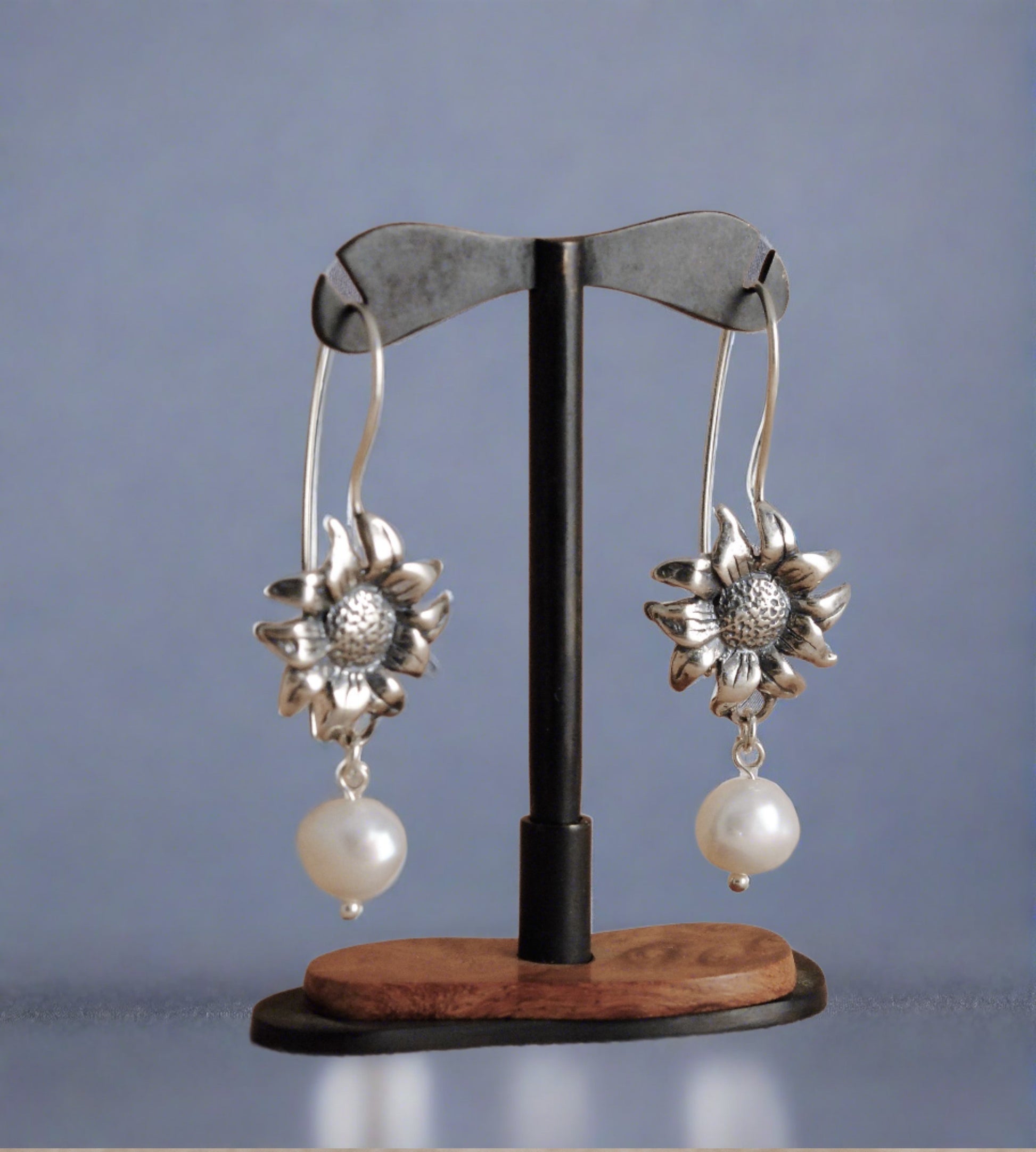 Silver earrings with big pearls