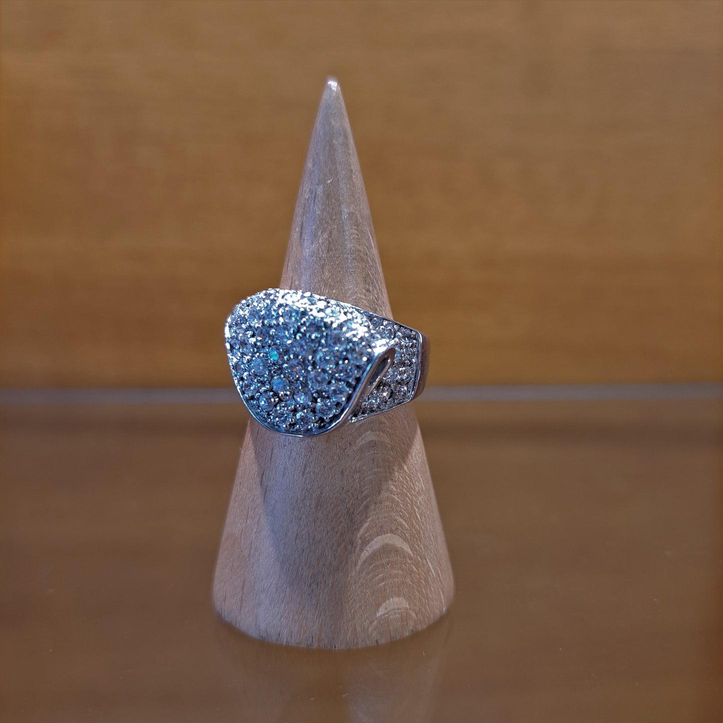 Folded sterling silver ring with zirkons
