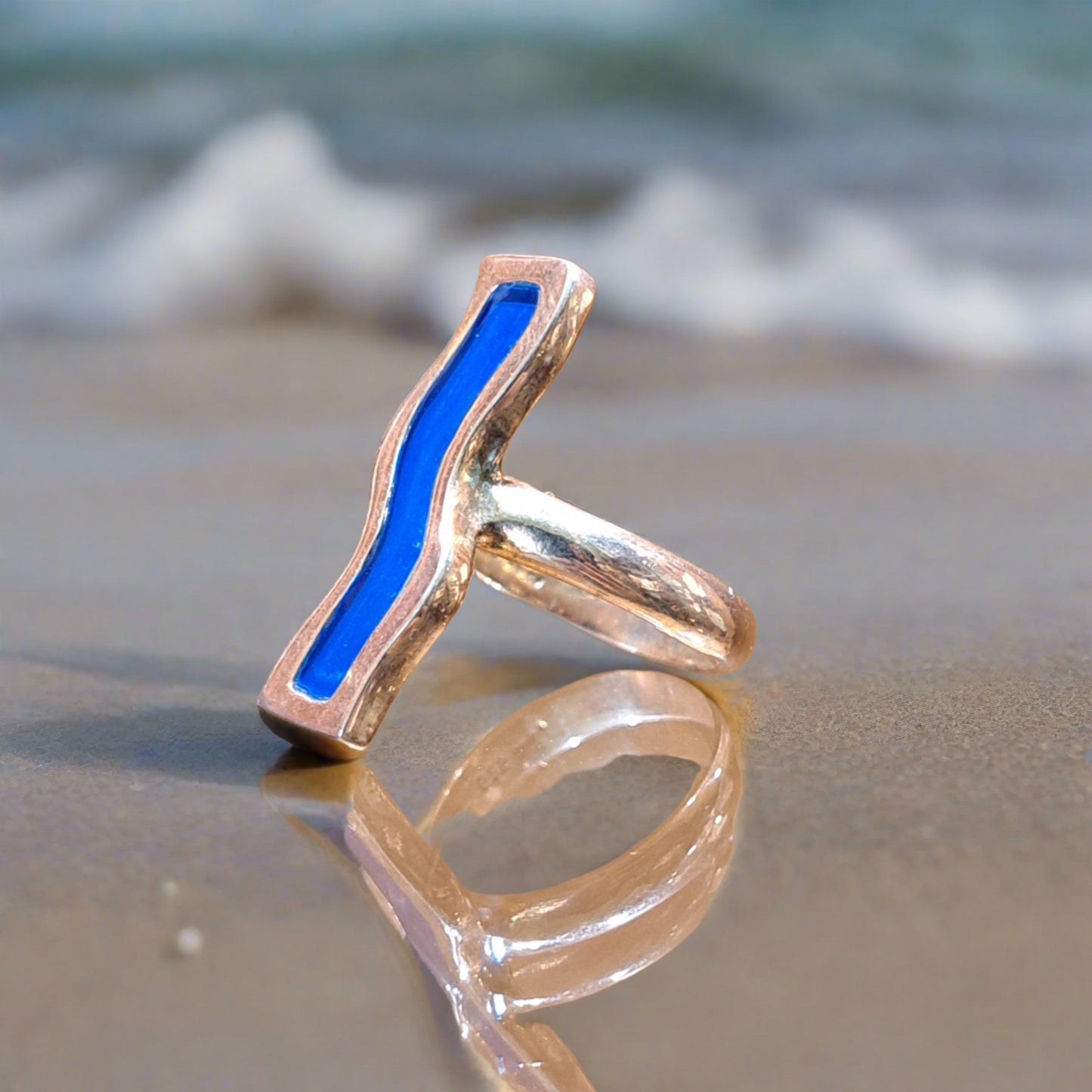 Gold plated silver ring with blue enamel